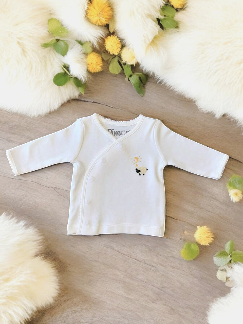 Conjunto bebé anticólicos blanco de manga larga con pequeño diseño de oveja en el centro